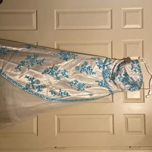 Beautiful strapless full length prom dress with embroidery and sequin details